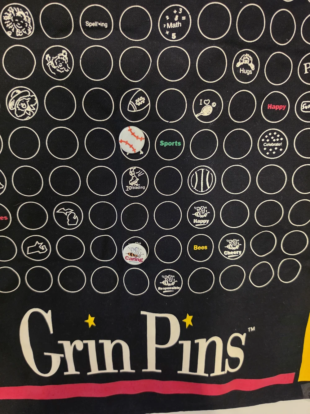 American Girl Black Grin Pins Display Banner with Green, Blue, Yellow Accents